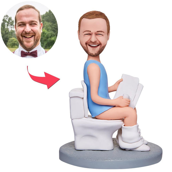 Man Sitting On The Toilet And Reading A Book Custom Bobbleheads With Engraved Text